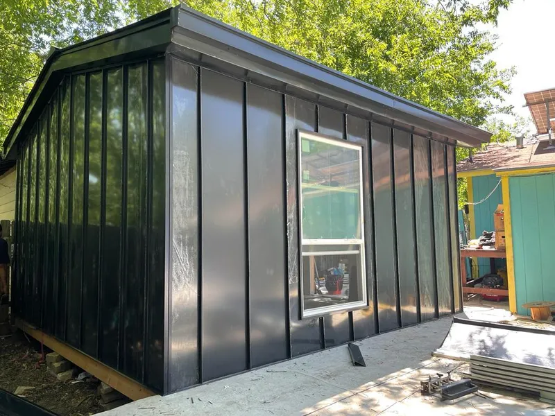 Black standing seam metal wall panels for Roof Inspection in Belleville