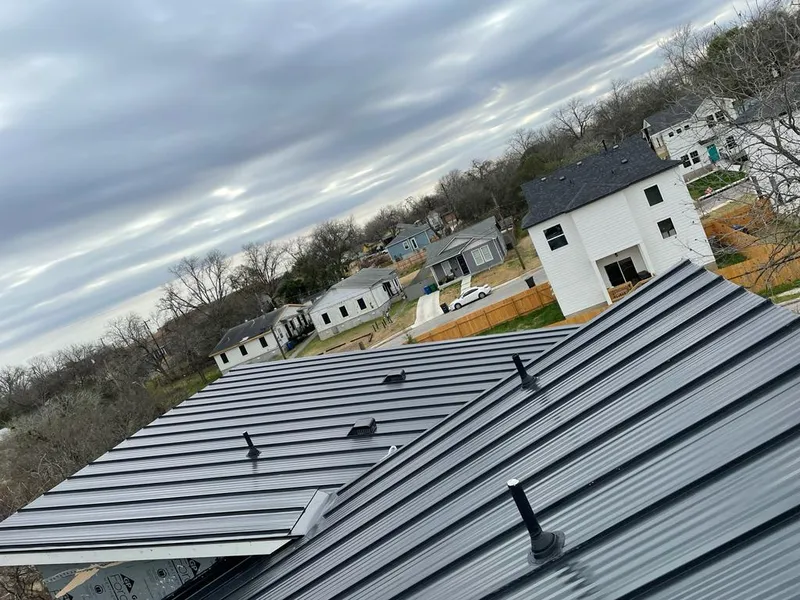 Standing seam metal roof panels with vents for Skylight Repair in Belleville